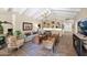Bright living room with built-in cabinets, comfortable seating, and neutral tones creating a welcoming atmosphere at 7955 E Chaparral Rd # 73, Scottsdale, AZ 85250