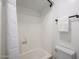 Bright bathroom features a clean, all-white shower and updated fixtures for a modern aesthetic at 8055 E Thomas Rd # 104, Scottsdale, AZ 85251