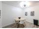 Cozy dining area with modern lighting and stylish decor at 8055 E Thomas Rd # 104, Scottsdale, AZ 85251