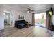 Comfortable living room with sliding glass doors and neutral decor at 8055 E Thomas Rd # 104, Scottsdale, AZ 85251