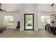 Bright and airy living space featuring wood floors, an open floor plan, and lots of natural light at 8156 E Questa Rd, Scottsdale, AZ 85255