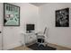Well-lit home office with motivational art creates a focused and inspiring workspace at 8156 E Questa Rd, Scottsdale, AZ 85255