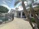 Spacious backyard with fenced pool area, mature landscaping, and a covered patio area, perfect for outdoor entertaining at 854 W Mesquite St, Gilbert, AZ 85233