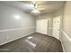 Neutral-toned bedroom featuring carpet, a ceiling fan, and a sliding closet door at 854 W Mesquite St, Gilbert, AZ 85233
