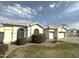 Well-maintained home featuring a two-car garage and lush landscaping, with neatly trimmed bushes at 854 W Mesquite St, Gilbert, AZ 85233