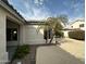 Exterior view highlighting the well-maintained landscaping and the home's architecture at 854 W Mesquite St, Gilbert, AZ 85233