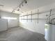 Clean garage with painted concrete floor and shelving at 854 W Mesquite St, Gilbert, AZ 85233