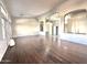 Elegant living room with hardwood floors and a chandelier providing ample natural light at 854 W Mesquite St, Gilbert, AZ 85233