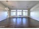 Open living room with hardwood floors and plenty of natural light streaming in at 854 W Mesquite St, Gilbert, AZ 85233