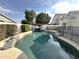 Beautiful pool features a waterfall and mature landscaping that provides a serene, resort-like atmosphere at 854 W Mesquite St, Gilbert, AZ 85233