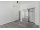 Bedroom featuring mirrored closet doors and an ensuite bathroom with carpet floors at 921 N Oxford Ln, Chandler, AZ 85225