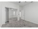 Bedroom featuring sliding closet doors and an ensuite bathroom with carpet floors at 921 N Oxford Ln, Chandler, AZ 85225