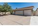 Spacious two-car garage offering ample parking and storage space in a well-maintained exterior at 921 N Oxford Ln, Chandler, AZ 85225