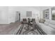 Cozy sitting area with stylish rug, comfortable seating, and view into the living area at 921 N Oxford Ln, Chandler, AZ 85225