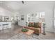 The open-concept living room showcases abundant natural light and a seamless flow into the adjacent dining area at 921 N Oxford Ln, Chandler, AZ 85225
