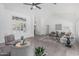 Bright living room featuring neutral paint, tile floors, vaulted ceilings, and comfortable seating arrangements at 921 N Oxford Ln, Chandler, AZ 85225