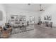 Spacious living room with abundant natural light, neutral decor, and an open floor plan at 921 N Oxford Ln, Chandler, AZ 85225