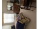 This bedroom features a dresser with a large mirror and a comfortable-looking bed at 9733 W Mcrae Way, Peoria, AZ 85382