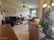 Bright and inviting living room with neutral tones, tile flooring, and large windows for natural light at 9733 W Mcrae Way, Peoria, AZ 85382