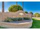 Meadow Park entrance sign featuring lush landscaping and a clear blue sky backdrop at 9733 W Mcrae Way, Peoria, AZ 85382