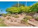Stone Westbrook Village sign surrounded by desert landscaping and clear blue sky at 9733 W Mcrae Way, Peoria, AZ 85382