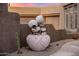 Unique decorative fountain adding charm to the courtyard and landscape at 9913 E Quarry Trl, Scottsdale, AZ 85262