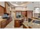 Gourmet kitchen featuring professional appliances, granite countertops, and custom cabinetry at 9913 E Quarry Trl, Scottsdale, AZ 85262