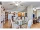 Open concept dining area with view into living room and kitchen, great for entertaining at 10330 W Thunderbird Blvd # A209, Sun City, AZ 85351