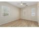 Bedroom with wood floors and lots of natural light at 13052 W Mine Trl, Peoria, AZ 85383