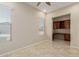 Bonus room with built in desk and storage at 13052 W Mine Trl, Peoria, AZ 85383