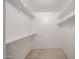 Walk-in closet with built-in shelving for optimal storage and organization at 13618 N 98Th Ave # C, Sun City, AZ 85351