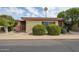 Charming single-story home featuring desert landscaping, a gated entryway, and lovely curb appeal at 13618 N 98Th Ave # C, Sun City, AZ 85351