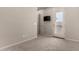 Bedroom featuring plush carpet flooring and access to a private balcony at 14674 W Pasadena Ave, Litchfield Park, AZ 85340