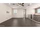 Open loft space featuring neutral paint, a ceiling fan, and recessed lighting at 14674 W Pasadena Ave, Litchfield Park, AZ 85340