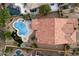 Birds eye view of a home with a pool, spa, fire pit, and ample lounging space, perfect for outdoor living at 1641 N Channing --, Mesa, AZ 85207