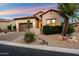 Charming single-story home with desert landscaping, stone accents, and a two-car garage in a quiet neighborhood at 1641 N Channing --, Mesa, AZ 85207