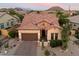 Charming home with a tile roof, desert landscaping, and a two-car garage in a serene neighborhood at 1641 N Channing --, Mesa, AZ 85207
