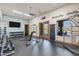 Bright gym with free weights, weight machines, fitness accessories, and mounted tv at 1641 N Channing --, Mesa, AZ 85207