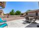 Outdoor living space featuring a stone patio with a seating area and low-maintenance landscaping at 1703 Leisure World --, Mesa, AZ 85206