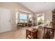 Bright living room featuring a large bay window that offers natural light and neighborhood views at 1703 Leisure World --, Mesa, AZ 85206