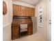 Cozy office space with a charming roll-top desk, filing cabinet, and additional shelving for efficient storage and organization at 1703 Leisure World --, Mesa, AZ 85206