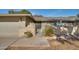 Charming home featuring a gated front porch with well-maintained landscaping and mature plants at 17668 N Del Webb Blvd, Sun City, AZ 85373