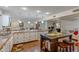 Stylish kitchen featuring granite countertops, hardwood floors, and modern appliances at 17668 N Del Webb Blvd, Sun City, AZ 85373