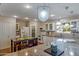 Well-lit kitchen featuring custom island, modern appliances, and a spacious design perfect for entertaining at 17668 N Del Webb Blvd, Sun City, AZ 85373