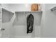 Organized walk-in closet with shelving and a hanging rod, offering ample storage space at 17831 W Mission Ln, Waddell, AZ 85355