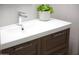 Close-up of a bathroom vanity with a modern faucet, clean lines, and stylish design at 1806 W Rosewood Ct, Chandler, AZ 85224