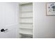 Linen closet with ample shelving space for organized storage and easy access at 1806 W Rosewood Ct, Chandler, AZ 85224