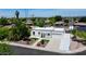 Stunning single-story home boasts a well-manicured front yard with fresh white paint and plenty of curb appeal at 1806 W Rosewood Ct, Chandler, AZ 85224