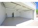 Spacious, well-lit garage with ample storage, a clean epoxy floor and a water heater at 1806 W Rosewood Ct, Chandler, AZ 85224