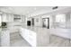 Modern kitchen with stainless steel appliances, granite countertops, and spacious island at 1806 W Rosewood Ct, Chandler, AZ 85224